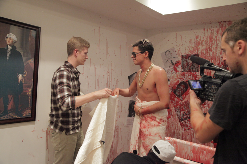 Milo steps out of a bath of pig’s blood